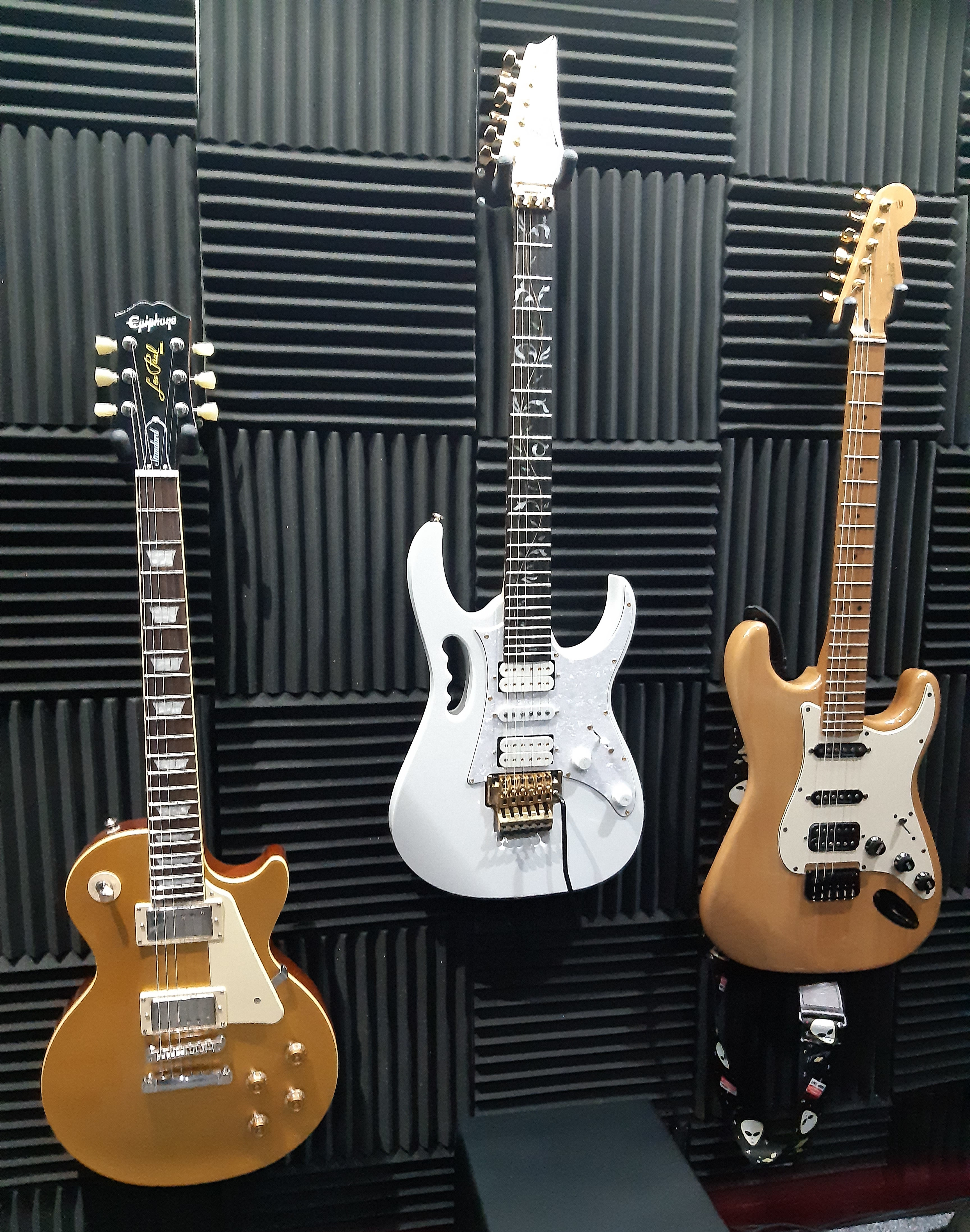 Martin's guitars on studio wall